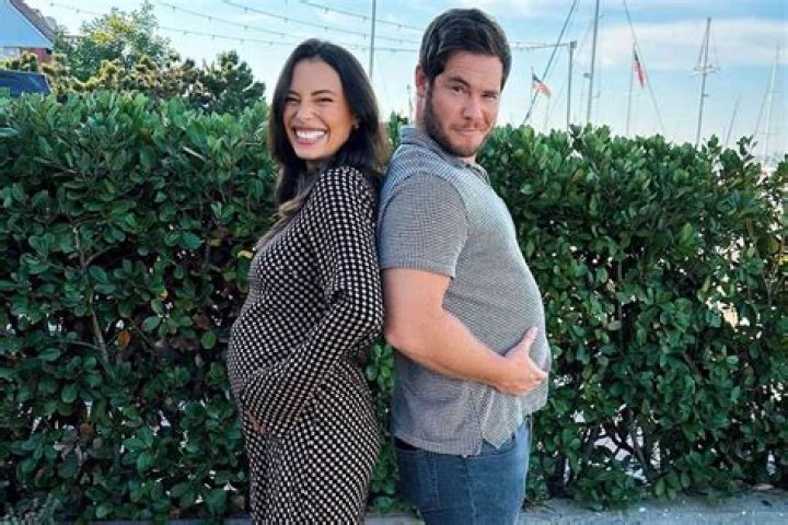 Adam Devine reveals wife Chloe Bridges is pregnant in hilarious matching bump photo