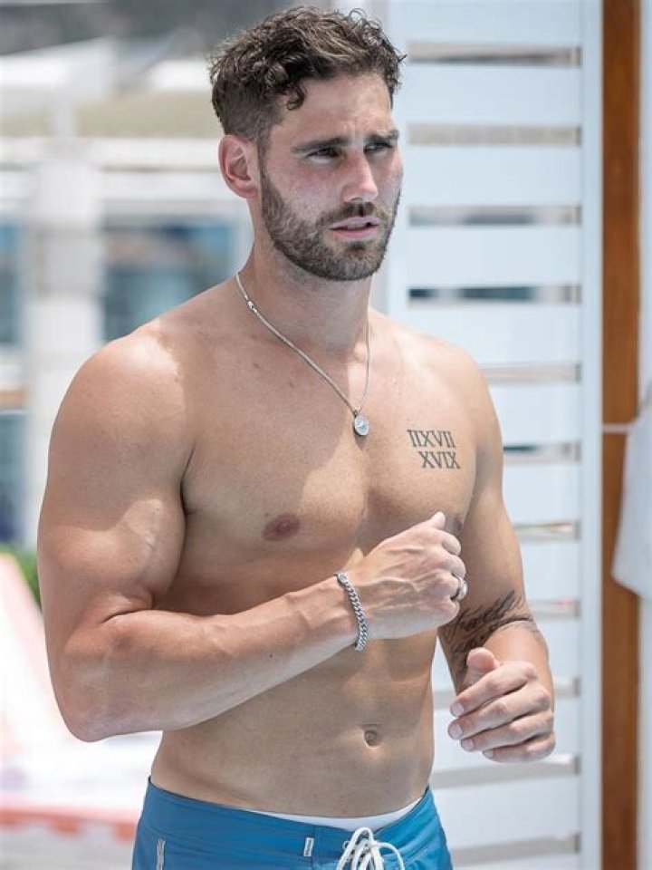 The Bachelorette's Ciarran Stott frolics NAKED at a nudist beach