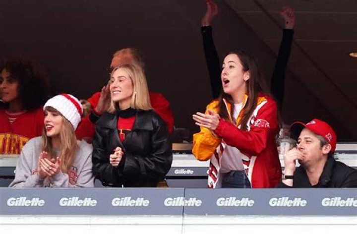 Travis Kelce Gazes at Taylor Swift Poster Ahead of Chiefs Game ·